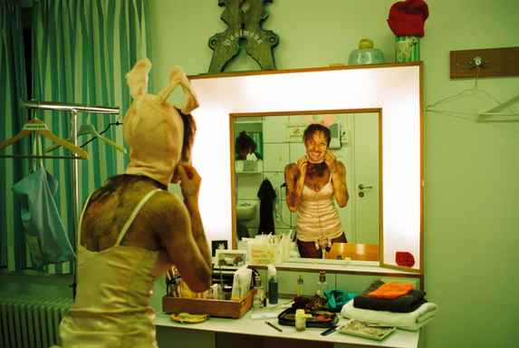 Munich Kammerspiele Backstage with Katharina Bach in a bunny costume looking in the mirror at Der Sturm