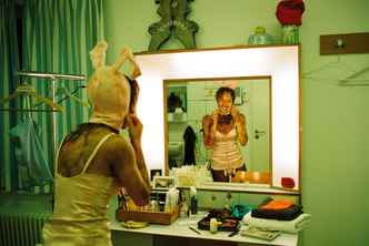 Munich Kammerspiele Backstage with Katharina Bach in a bunny costume looking in the mirror at Der Sturm