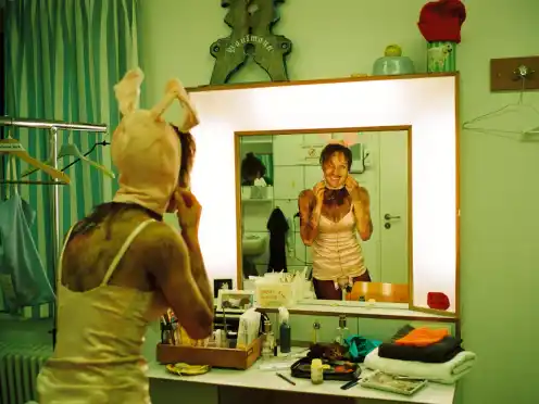 Munich Kammerspiele Backstage with Katharina Bach in a bunny costume looking in the mirror at Der Sturm