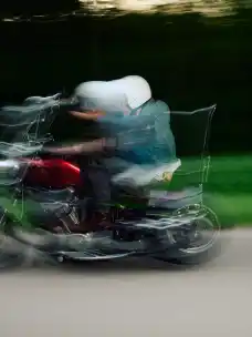 A man riding a motorbike with motion blur from the project Elsewhere